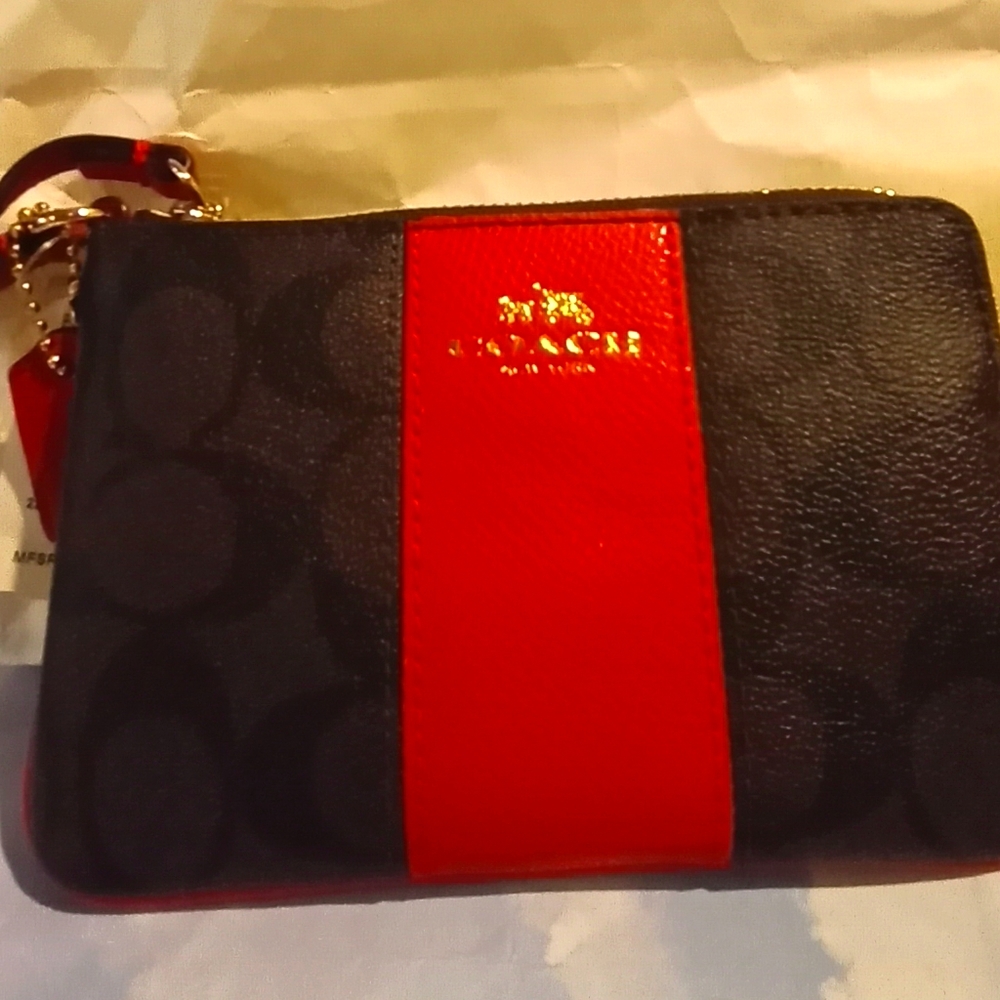 Coach wristlet. 6 inchs. By. 4 inchs.